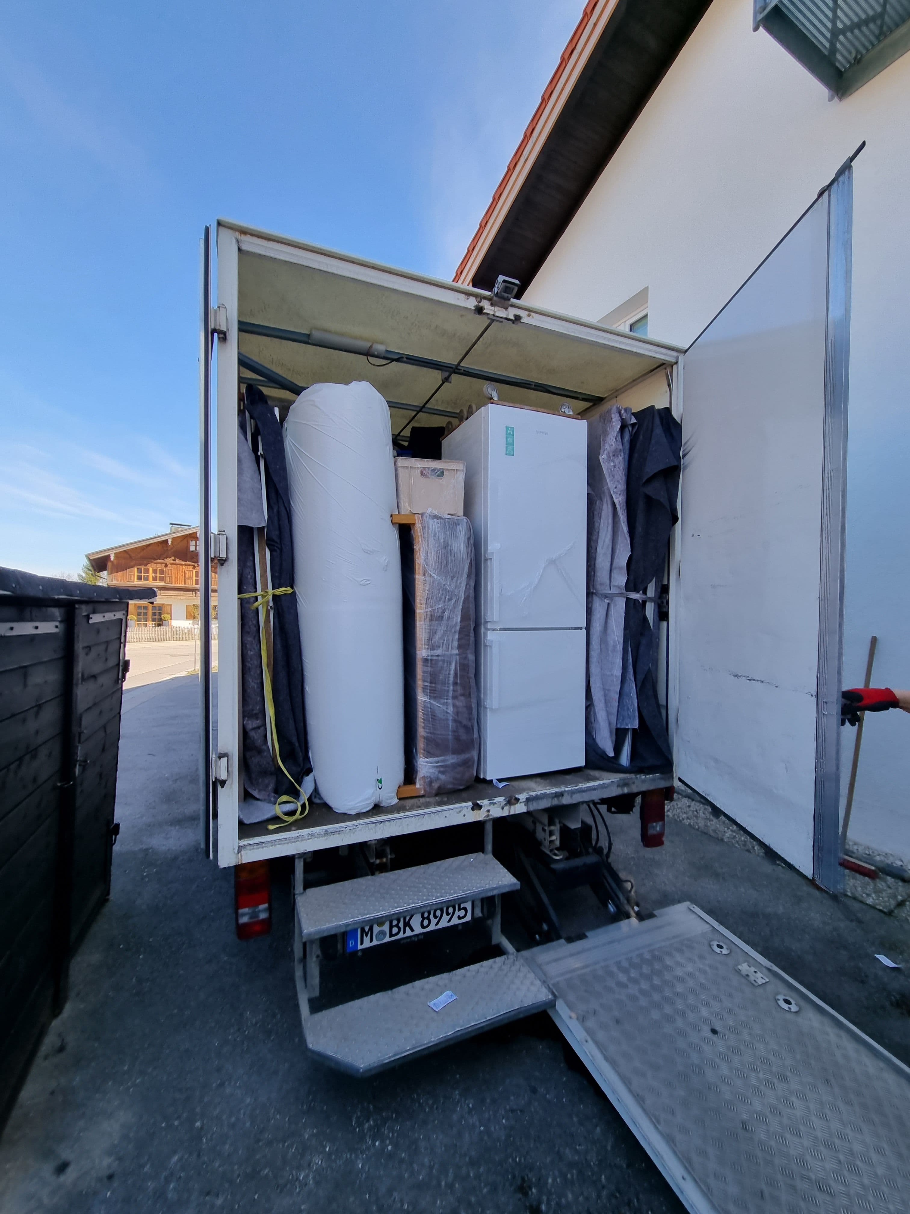 Senior person being assisted during a move